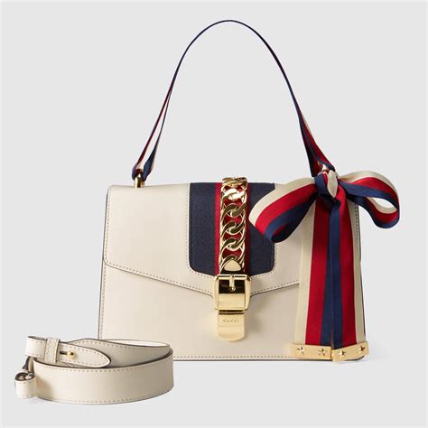 white gucci preme|Gucci purses for women.